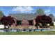 Inviting backyard featuring a pool, patio, and lush landscaping, perfect for outdoor relaxation at 166 Weldon Dr, Clayton, NC 27520