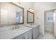 Bright bathroom featuring double vanity with marble countertops at 166 Weldon Dr, Clayton, NC 27520