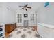 Well-lit bedroom with a hardwood floor, rug, and furnishings at 166 Weldon Dr, Clayton, NC 27520