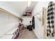 Walk-in closet with white shelving and plenty of storage space at 166 Weldon Dr, Clayton, NC 27520