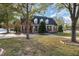 Beautiful brick home with manicured lawn and mature trees at 166 Weldon Dr, Clayton, NC 27520