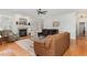 Bright living room featuring a fireplace, comfortable seating, and an open floor plan at 166 Weldon Dr, Clayton, NC 27520