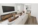Bright and airy living room features hardwood floors and an open floor plan at 3929 Willow Gate Way, Raleigh, NC 27604