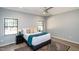 Inviting bedroom with hardwood floors, large windows, and neutral decor at 1414 Whippoorwill Ln, Chapel Hill, NC 27517