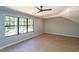 Large room with window overlooking treeline at 1414 Whippoorwill Ln, Chapel Hill, NC 27517