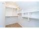 Walk-in closet with built-in shelving and ample storage space for organization at 1414 Whippoorwill Ln, Chapel Hill, NC 27517