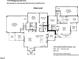 Detailed floor plan of the main level, showcasing an oversized two-car garage, kitchen, living room, bedrooms and dining spaces at 1414 Whippoorwill Ln, Chapel Hill, NC 27517