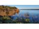 Beautiful lake with mature trees and various colors, blue skies and natural lighting at 1414 Whippoorwill Ln, Chapel Hill, NC 27517