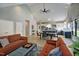 Open concept living, dining, and kitchen area with vaulted ceilings and natural light at 1414 Whippoorwill Ln, Chapel Hill, NC 27517