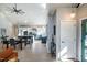Open floor plan featuring living, dining, and kitchen, with vaulted ceilings and modern finishes at 1414 Whippoorwill Ln, Chapel Hill, NC 27517