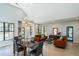Open concept living space with seating area, dining space, and views of entry at 1414 Whippoorwill Ln, Chapel Hill, NC 27517