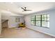 Finished living space featuring a sitting area with natural light and vinyl plank flooring at 1414 Whippoorwill Ln, Chapel Hill, NC 27517