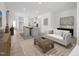 Spacious living room with wood floors, modern furnishings, and an open layout to the kitchen at 520 Gainer Dr # 6, Raleigh, NC 27610