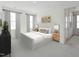 Bright bedroom with neutral colors, large windows, and a view into the bathroom at 520 Gainer Dr # 6, Raleigh, NC 27610