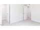 Bedroom features neutral paint, plush carpet, and walk-in closet at 70 Little Creek Dr, Lillington, NC 27546