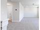 Bonus room boasts neutral walls, plush carpet, and recessed lighting at 70 Little Creek Dr, Lillington, NC 27546