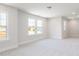 Bonus room has carpeted floors, several windows, and neutral walls at 70 Little Creek Dr, Lillington, NC 27546