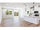 Open-concept kitchen with white cabinets, an island, and stainless steel appliances at 70 Little Creek Dr, Lillington, NC 27546