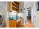 Dedicated desk nook with built-in cabinets and granite countertop, ideal for a home office or study space at 413 Chadwick Ln, Efland, NC 27243