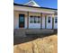 Charming farmhouse exterior with covered porch at 8536 Savage Rd, Spring Hope, NC 27882