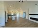 Open living space with high ceilings, fireplace, and hardwood floors at 8536 Savage Rd, Spring Hope, NC 27882