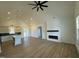Bright living area with high ceilings, fireplace, and hardwood floors at 8536 Savage Rd, Spring Hope, NC 27882