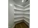 Spacious corner pantry with ample shelving at 8536 Savage Rd, Spring Hope, NC 27882