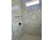 Elegant shower with marble-look tile, black fixtures, and a built-in niche at 8536 Savage Rd, Spring Hope, NC 27882
