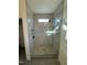 Large walk-in shower with marble tile and glass enclosure at 8536 Savage Rd, Spring Hope, NC 27882