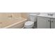 Clean bathroom with tub, toilet and vanity at 501 Kendall Dr, Durham, NC 27703
