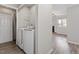 Stackable washer and dryer in laundry closet at 501 Kendall Dr, Durham, NC 27703