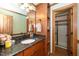 Bathroom with granite countertop and walk-in shower at 7925 S Highway 55, Willow Springs, NC 27592