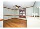 Bright bedroom with hardwood floors and window seat at 7925 S Highway 55, Willow Springs, NC 27592