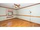 Bright bedroom with hardwood floors and window seat at 7925 S Highway 55, Willow Springs, NC 27592