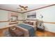 Bedroom with hardwood floors and window seat at 7925 S Highway 55, Willow Springs, NC 27592