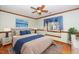 Bedroom with hardwood floors and window seat at 7925 S Highway 55, Willow Springs, NC 27592