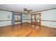 Hardwood floor Gathering room with access to backyard patio at 7925 S Highway 55, Willow Springs, NC 27592