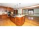 Spacious kitchen featuring island and stainless steel appliances at 7925 S Highway 55, Willow Springs, NC 27592