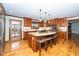 Kitchen with center island and breakfast bar at 7925 S Highway 55, Willow Springs, NC 27592