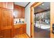 Laundry room with access to backyard at 7925 S Highway 55, Willow Springs, NC 27592