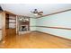 Living room with brick fireplace and hardwood floors at 7925 S Highway 55, Willow Springs, NC 27592
