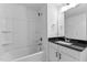 Bathroom featuring a bath tub and a vanity with black countertop at 955 Alma Railway Dr # 563, Wake Forest, NC 27587