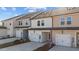 New townhomes feature garages, patios, and neutral color schemes for a cohesive community look at 955 Alma Railway Dr # 563, Wake Forest, NC 27587