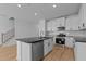 Bright, updated kitchen with white cabinets, granite countertops and stainless steel appliances at 955 Alma Railway Dr # 563, Wake Forest, NC 27587