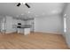 Open concept living room area with hardwood floors and lots of natural light at 955 Alma Railway Dr # 563, Wake Forest, NC 27587