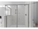 Close up of a modern tiled glass shower with built in storage at 955 Alma Railway Dr # 563, Wake Forest, NC 27587