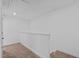 Staircase landing with carpeted floors at 955 Alma Railway Dr # 563, Wake Forest, NC 27587