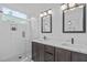 Bathroom with glass shower, dual vanity with marble countertops at 10 Seawell Ave # 102, Raleigh, NC 27601