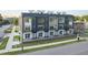 Modern multi-story townhomes featuring a variety of exterior finishes and private balconies at 10 Seawell Ave # 102, Raleigh, NC 27601