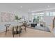 Cozy living area with modern furniture, a decorative rug, and sliding glass doors to a balcony at 10 Seawell Ave # 102, Raleigh, NC 27601